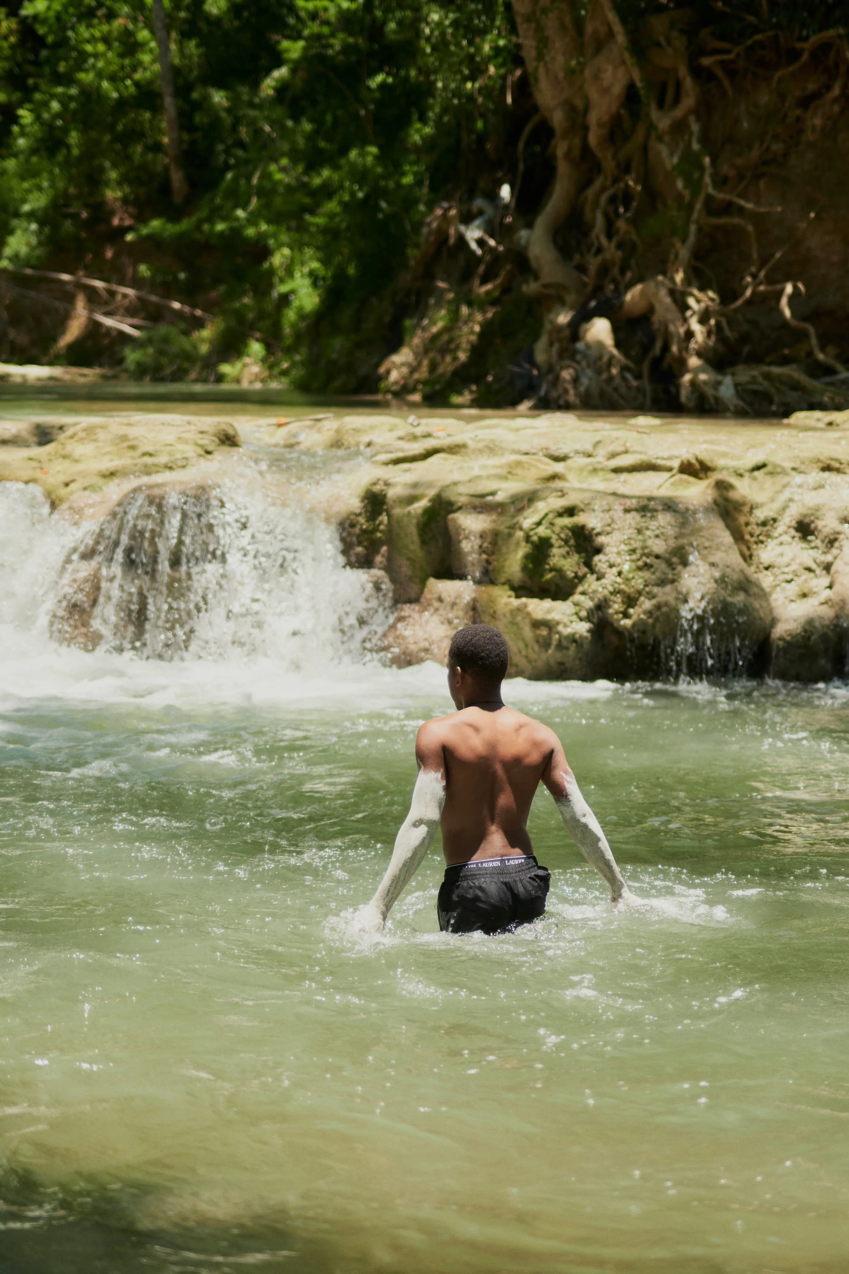 Dunn's River Falls cascading through tropical jungle